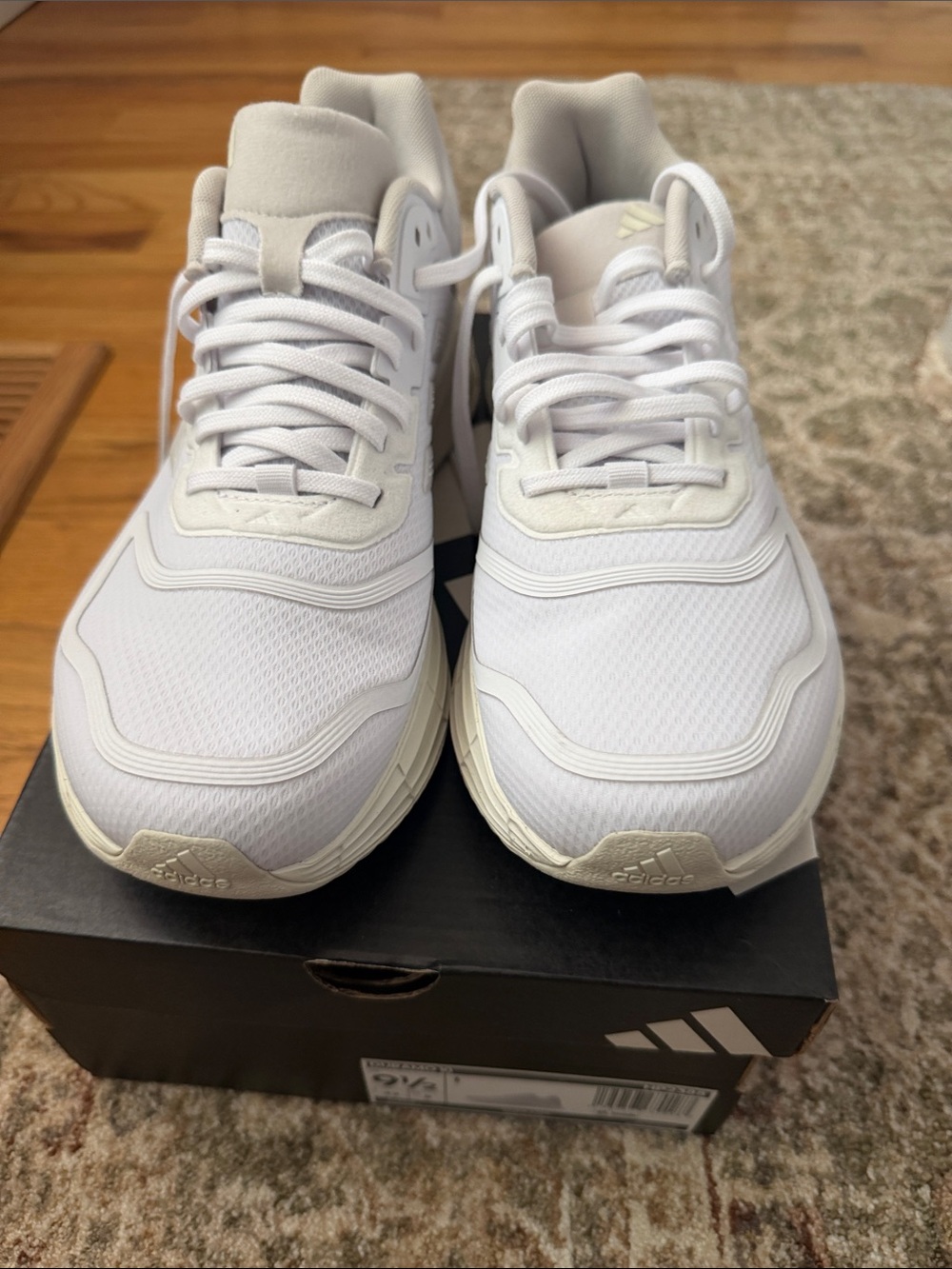 Adidas women’s White Athletic Sneakers with Cream Accents